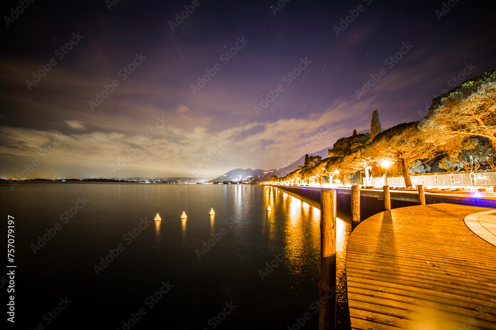 Salo on lake Garda pier illuminated at night