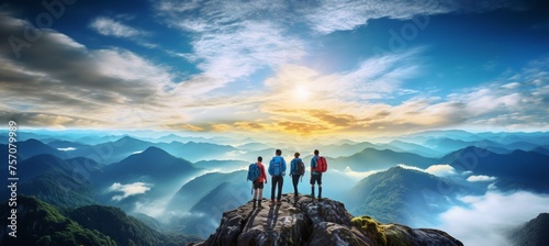 Group of tourists walking on mountain path enjoying scenic views and fresh air on a sunny day