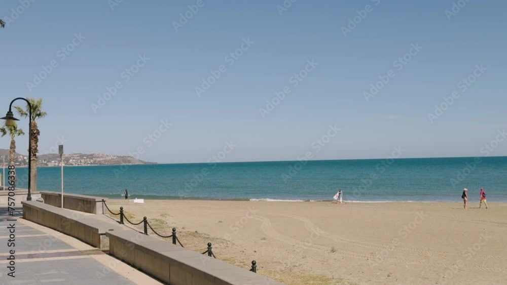 Walk through a sunny city. Walk through the city of Benicassim by the sea in winter. Warm sunny day at the end of February. Province of Castellon. Spain sea in winter. Walk through a sunny city. Walk through the city of Benicassim by the sea in winter. Warm sunny day at the end of February. Province of Castellon. Spain sea in winter.