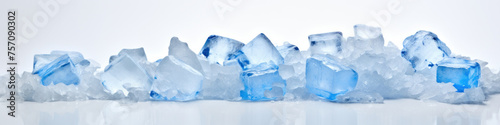 A pile of crushed blue ice cubes on a white background.