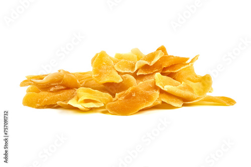 Dried mango pieces, isolated on white background.