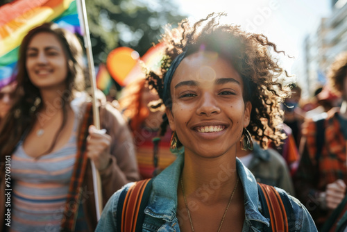 Joyful Diversity: Young Woman Cheers at Pride Parade © artem