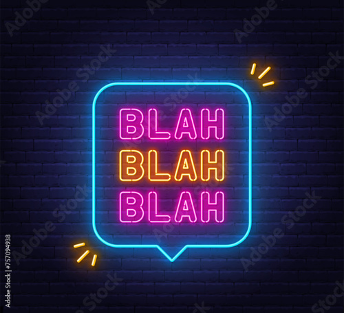 Blah neon sign in the speech bubble on brick wall background.