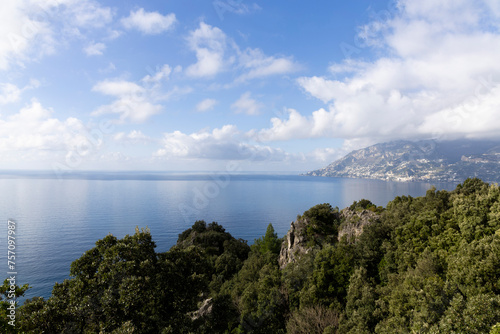 Amalfi coast, view of the mountainous coast washed by the sea and caressed by the blue sky
