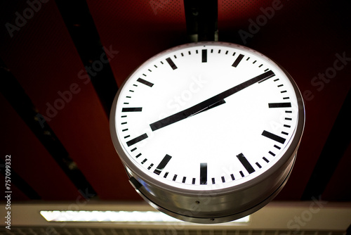Clock telling time in the subway station