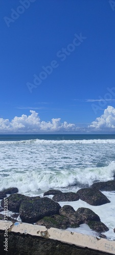 sea and clouds with sea waves or beach