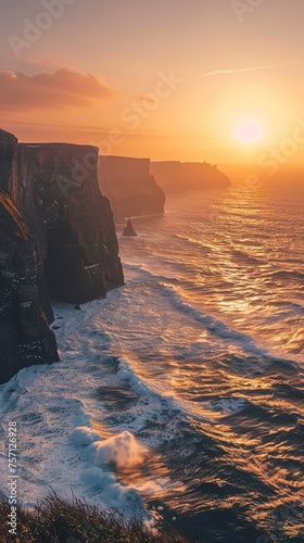 Vertical landscape of ocean with huge waves crashing into shoreline rocks photo