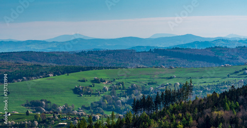 Virew to Moravskoslezske Beskydy mountains from meadow covered ridge of Bile Karpaty mountains near Vyskovec village photo
