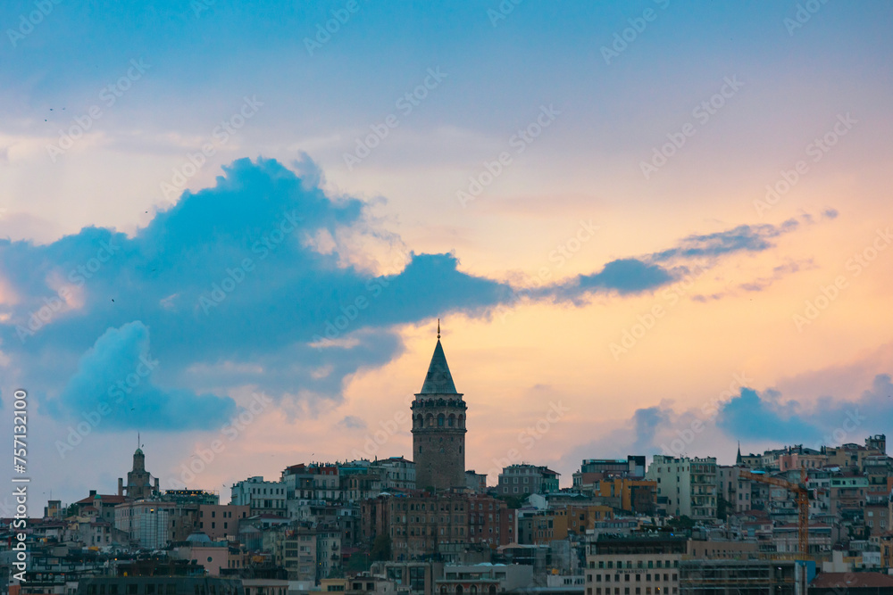 Galata Tower view from a ferry at sunset.