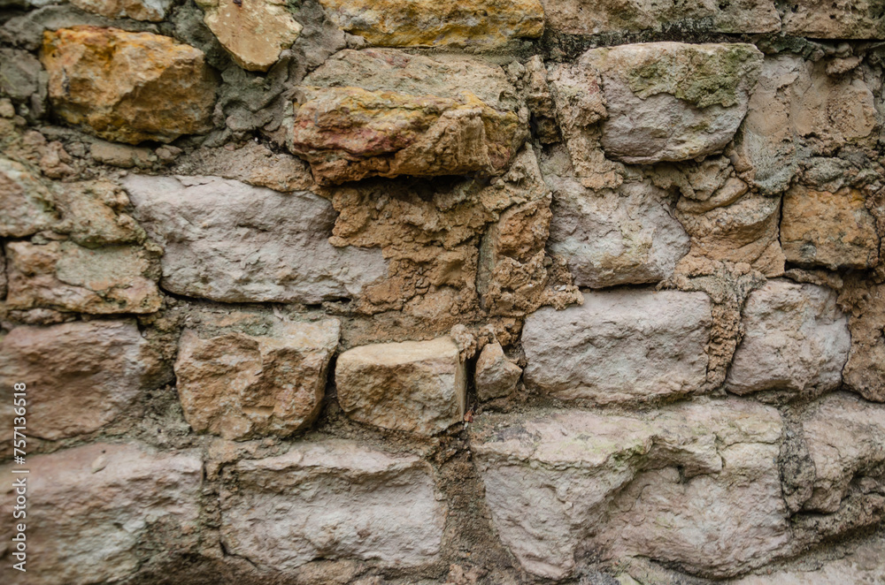 Background of masonry stones, rocky wall