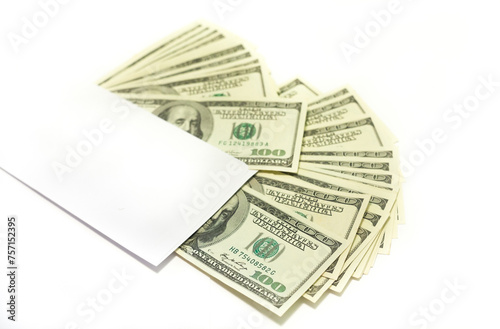 Dollar bills and white envelope