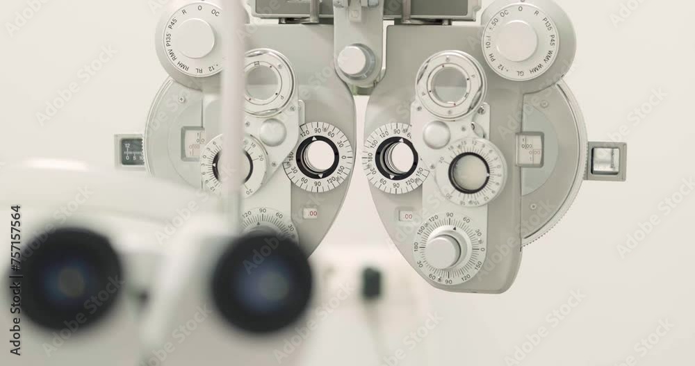 close up of phoropter, specialized instrument used in eye examinations to measure refractive errors and determine eyeglass prescriptions, eye medical clinic close up of phoropter, specialized instrument used in eye examinations to measure refractive errors and determine eyeglass prescriptions, eye medical clinic