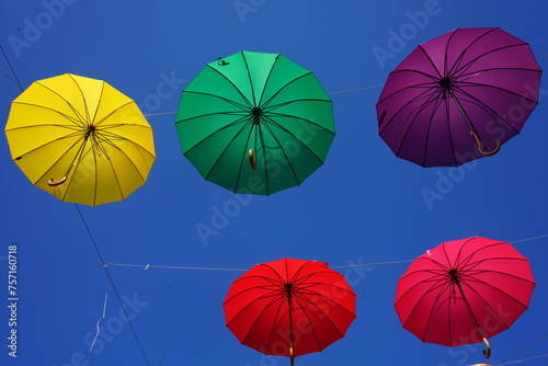 colorful umbrellas on blue sky