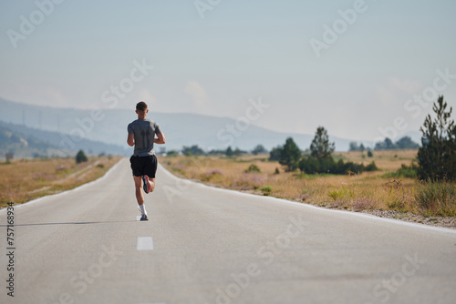 A dedicated marathon runner pushes himself to the limit in training. © .shock