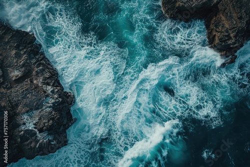 Aerial View of Ocean and Rocks, Majestic Natural Beauty in Shades of Blue, A gripping aerial spectacle of a stormy sea clashing with a rocky shore, AI Generated