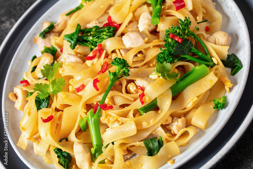 rice noodles with chicken, eggs, chinese broccoli © myviewpoint