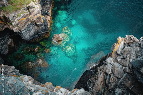 A stunning aerial perspective of a body of water enclosed by rocky landscapes, A high angle view of where brilliant turquoise sea meets rocky shores, AI Generated