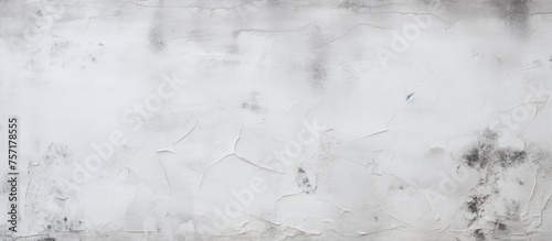 A close up of a white monochrome wall with a gray textured pattern, resembling freezing winter water. Perfect for event backdrops or transparent materials in monochrome photography