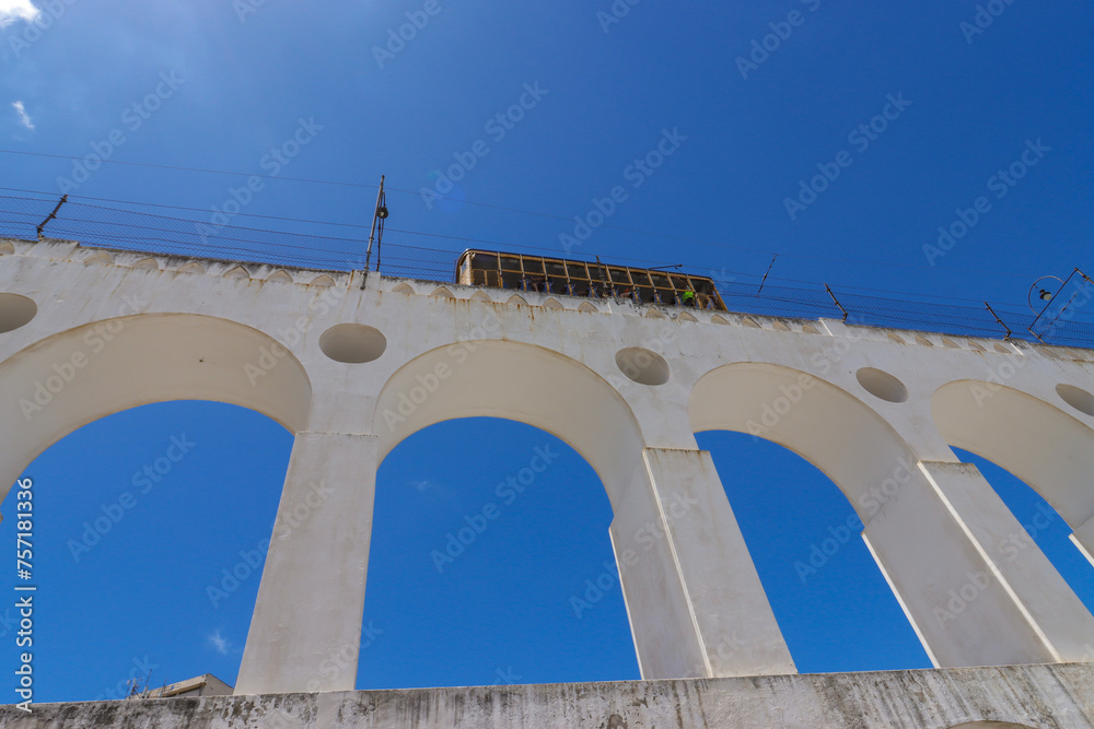 Rio de Janeiro, RJ, Brazil, 03/11/2024 - Carioca Aqueduct, also known as Arcos da Lapa, was erected in the 18th century in downtown Rio. The Santa Teresa cable car passes the top of the aqueduct