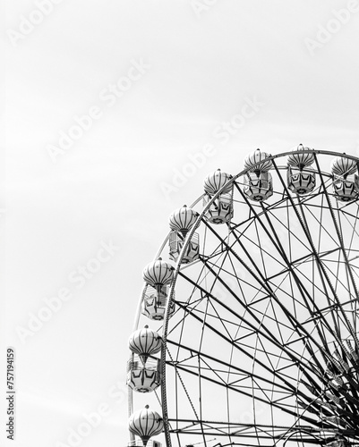Ferris wheel. A part of a ferris wheel. Black and white and minimalist photography. 