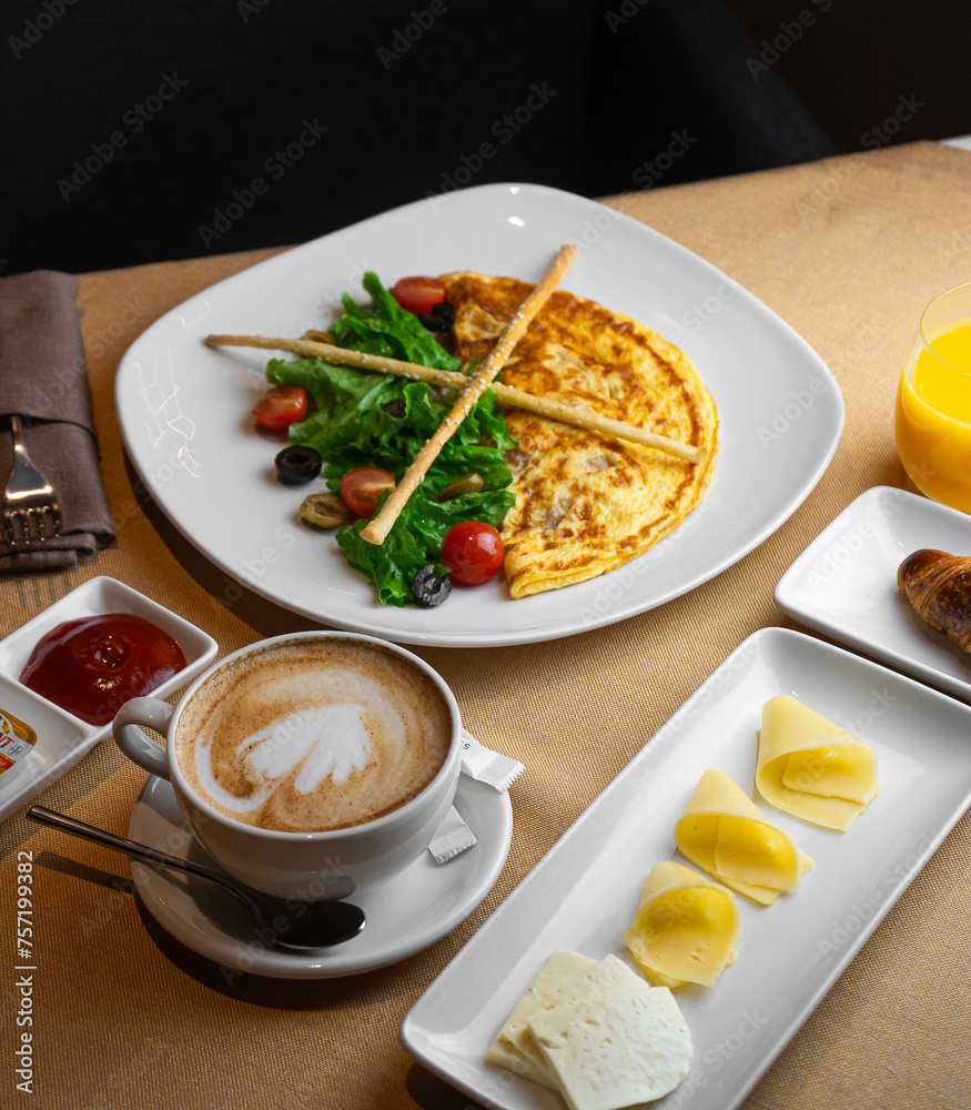 Breakfast omelette with aromatic cappuccino Breakfast omelette with aromatic cappuccino
