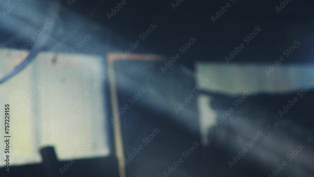 Supernatural bright beam of light fills the screen, the suns rays shine through the cracks, slow motion, camera movement Supernatural bright beam of light fills the screen, the suns rays shine through the cracks, slow motion, camera movement