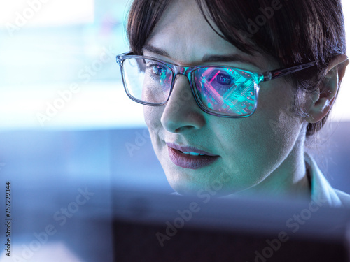 AI Engineering, Female STEM engineer using artificial intelligence to design micro electronics in the lab. photo