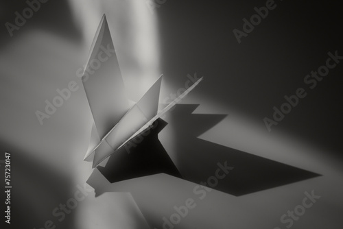 Monochromatic elegance: an origami crane in stillness photo