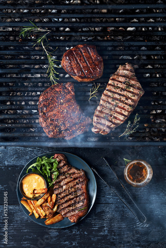 Grilled delights a variety of meats cooked to perfection on the barbecue photo