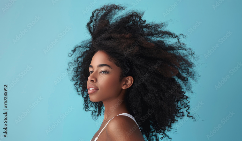 Beautiful Black Woman with Long Curly Hair Flying, Blue Background