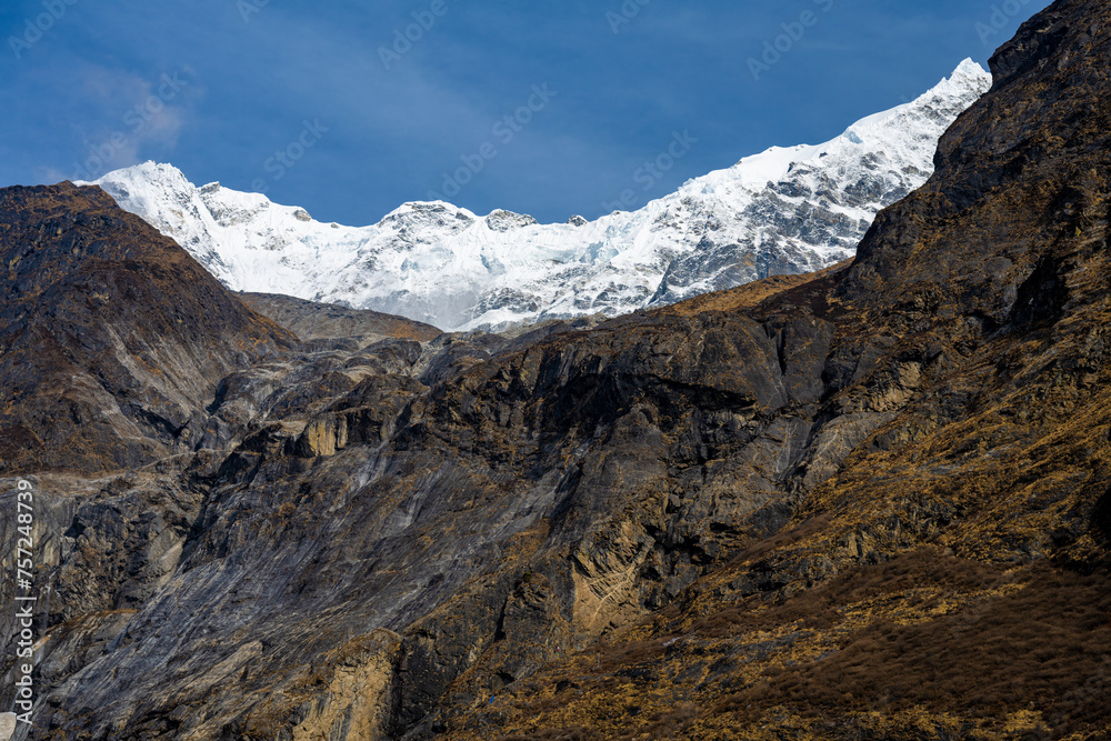 Contrast of Rugged Cliffs and Snow-Capped Summits, Trek from Mundu to Lama Hotel, Langtang, Nepal