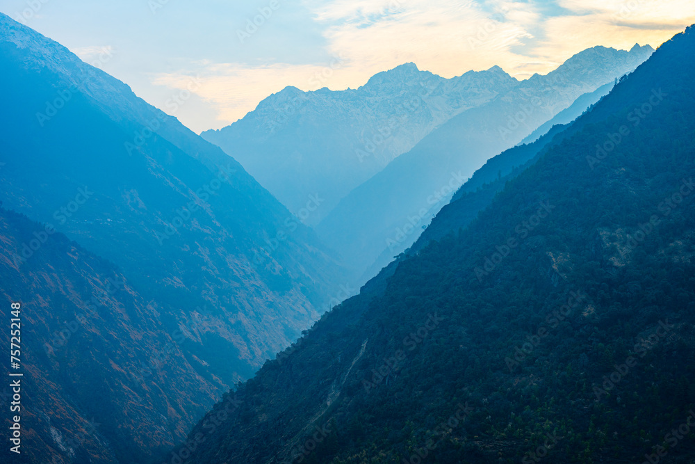 Misty Mountain Layers at Dawn, Thulo Syabru to Sing Gompa Trek, Gosaikunda, Nepal Misty Mountain Layers at Dawn, Thulo Syabru to Sing Gompa Trek, Gosaikunda, Nepal