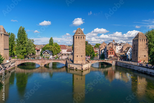 Panoramic view on The Ponts Couverts in Strasbourg with blue cloudy sky. France. © volff