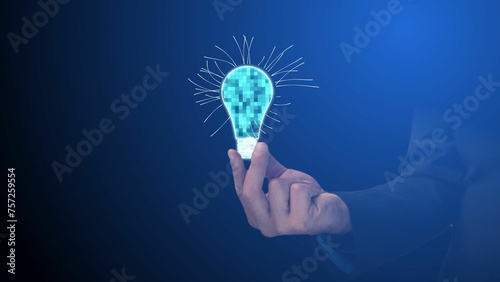 Cg tech collage. A male hand holds a digital symbol of a light bulb in which the light is burning. Concept of new idea and power of thought