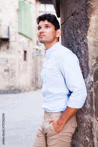 Man posing in gothic quarter of Barcelona