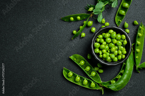 Shelled green peas in a bowl. Healthy food. Top view. © Yaruniv-Studio
