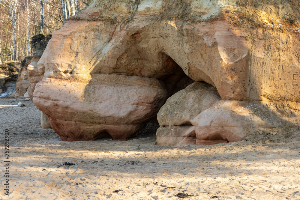 Enigmatic Rock Formation Amidst the Tranquil Forest Landscape.Veczemju cliffs, Latvia Enigmatic Rock Formation Amidst the Tranquil Forest Landscape.Veczemju cliffs, Latvia