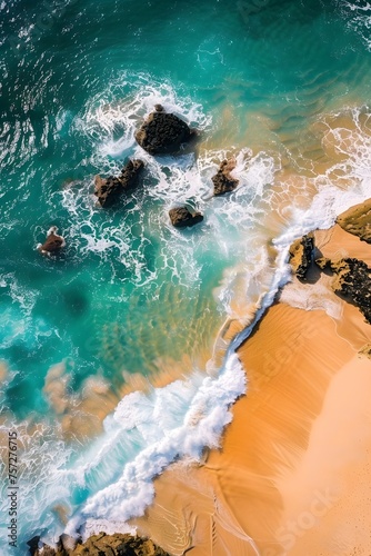 Aerial shot of Oahu National Park, Hawaii, showcasing stunning waves, golden sand, and turquoise waters against rocky shores.