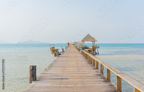 View of the wooden bridge extending into the sea of Koh Mak, Thailand. © Photo Gallery