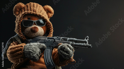 Teddy bear wearing a ski mask and holding a gun