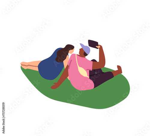 Cute couple relaxes on lawn during walk in park. Lovers sit on grass on romantic date outdoor. Girlfriend and boyfriend take selfie photo together by phone. Flat isolated vector illustration on white
