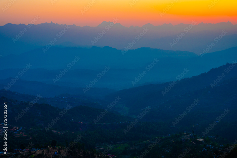 Dusk's Gradient over Dhulikhel, Nepal: Layered Mountain Silhouettes Dusk's Gradient over Dhulikhel, Nepal: Layered Mountain Silhouettes