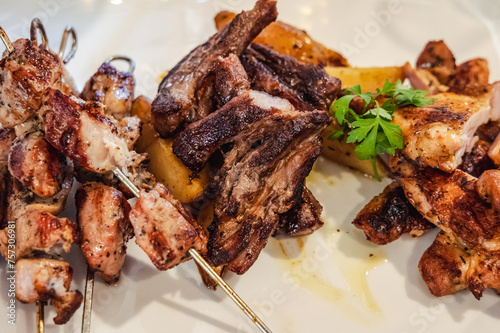 Obraz na płótnie Souvlaki shashliks with onion on a plate Cyprus island country w salonie