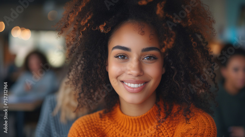 Curly-Haired Young Woman Smiling in Cafe. Vibrant portrait of a young woman with curly hair and a bright smile in a casual cafe environment. © Old Man Stocker