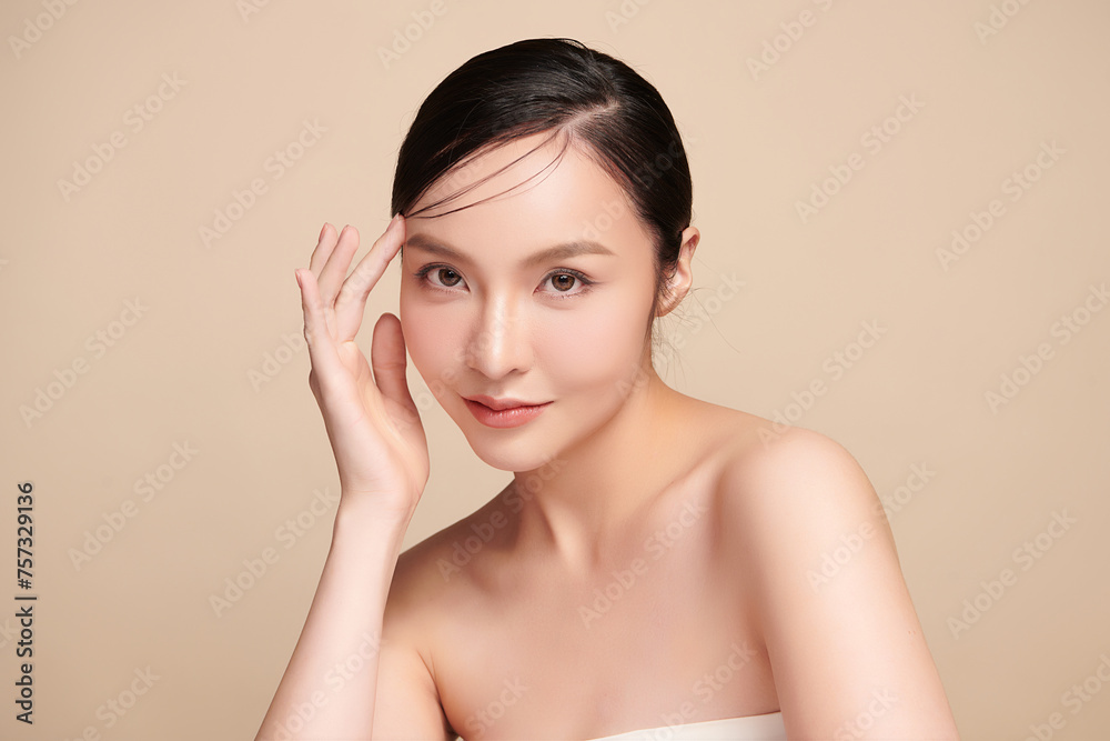 Beautiful young asian woman with clean fresh skin on beige background, Face care, Facial treatment, Cosmetology, beauty and spa, Asian women portrait. Beautiful young asian woman with clean fresh skin on beige background, Face care, Facial treatment, Cosmetology, beauty and spa, Asian women portrait.