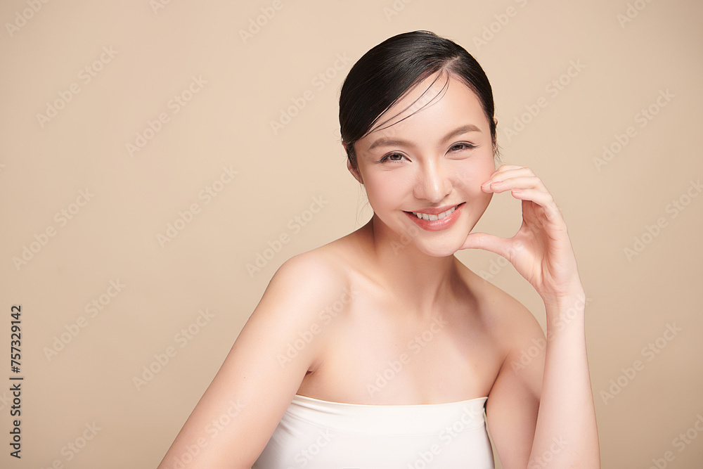 Beautiful young asian woman with clean fresh skin on beige background, Face care, Facial treatment, Cosmetology, beauty and spa, Asian women portrait. Beautiful young asian woman with clean fresh skin on beige background, Face care, Facial treatment, Cosmetology, beauty and spa, Asian women portrait.