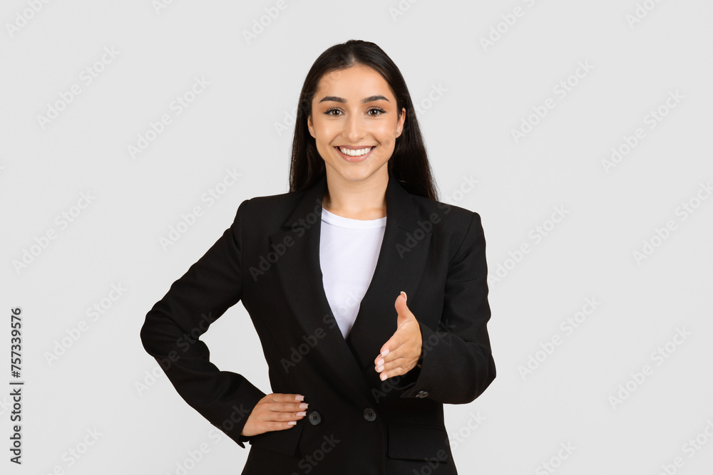 Professional woman with handshake gesture Professional woman with handshake gesture