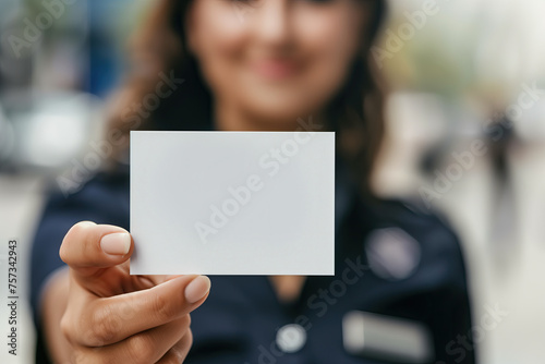 police officer woman holding blank card