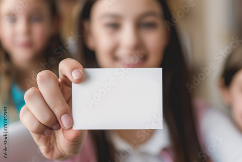 young woman person holding blank card