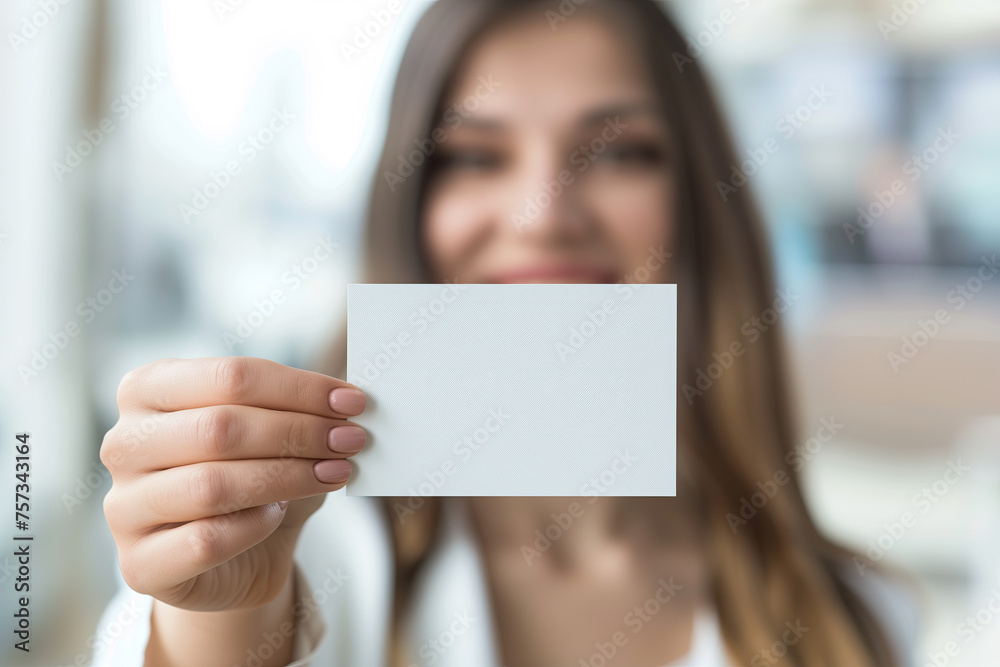 woman holding blank card woman holding blank card
